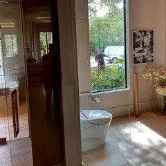 Before: Clear glass panel offers no privacy