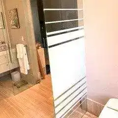 After: Decorative film adds privacy, keeps open feel